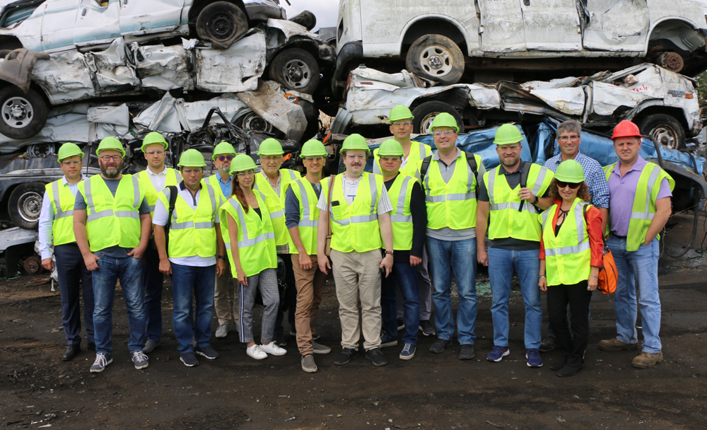 Kevin Gershowitz (back row, second from right), President, Gershow Recycling, is joined by Pete Vaillant (back row, right), Manager, Gershow Recycling, and members of Ruslom, an organization comprised of scrap metal company representatives from Russia, whom Gershow hosted at a tour of its Medford facility on September 13.