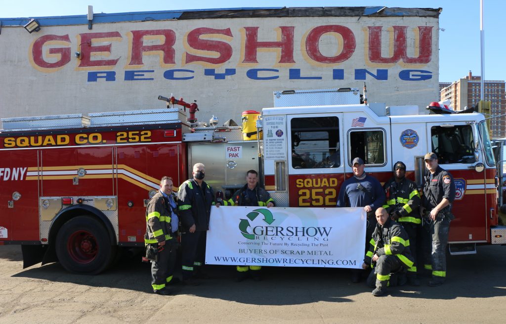 Eric Kugler (second from left), Manager, Gershow Recycling, presented turkeys to members of FDNY’s Rescue Squad 252.