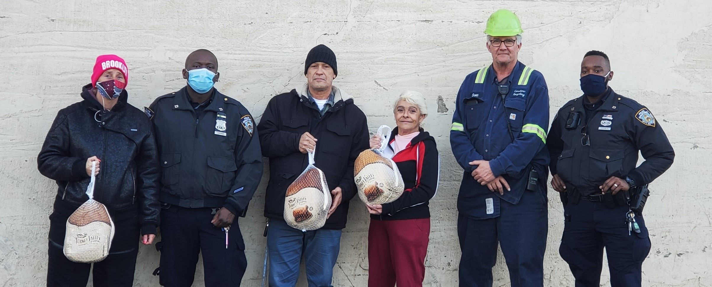 Scott Kolesari (second from right), Manager, Gershow Recycling, presented turkeys to members of NYPD’s 73rd Precinct.