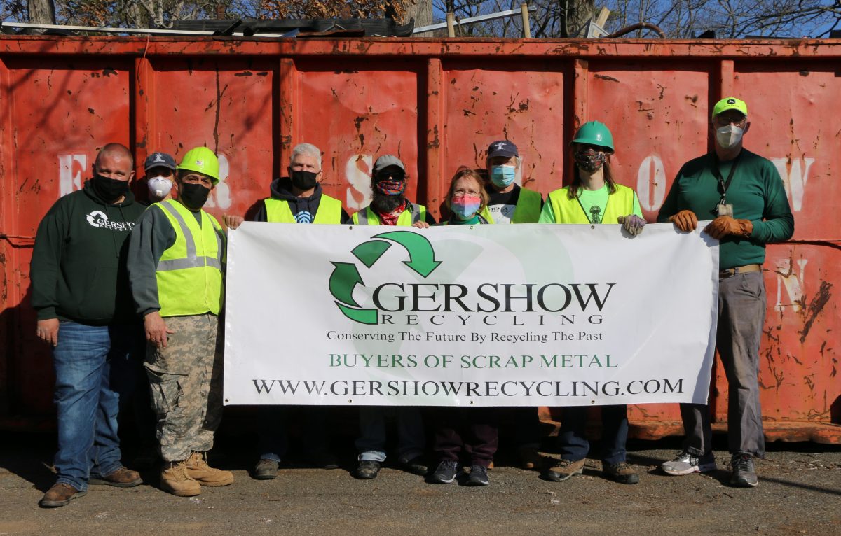 David Seiler (left), Account Executive, Gershow Recycling Corporation, joins the members of the Tesla Science Center at Wardenclyffe at the “Metal for Tesla” event in Shoreham on March 20. Also pictured (left to right): Douglas Borge, Chief Operating Officer; Paul Rosa, Volunteer; Eugene Genova, Board Member; Dan Black, Judy Black, Jeff Brown and Karl Sidenius, Volunteers.