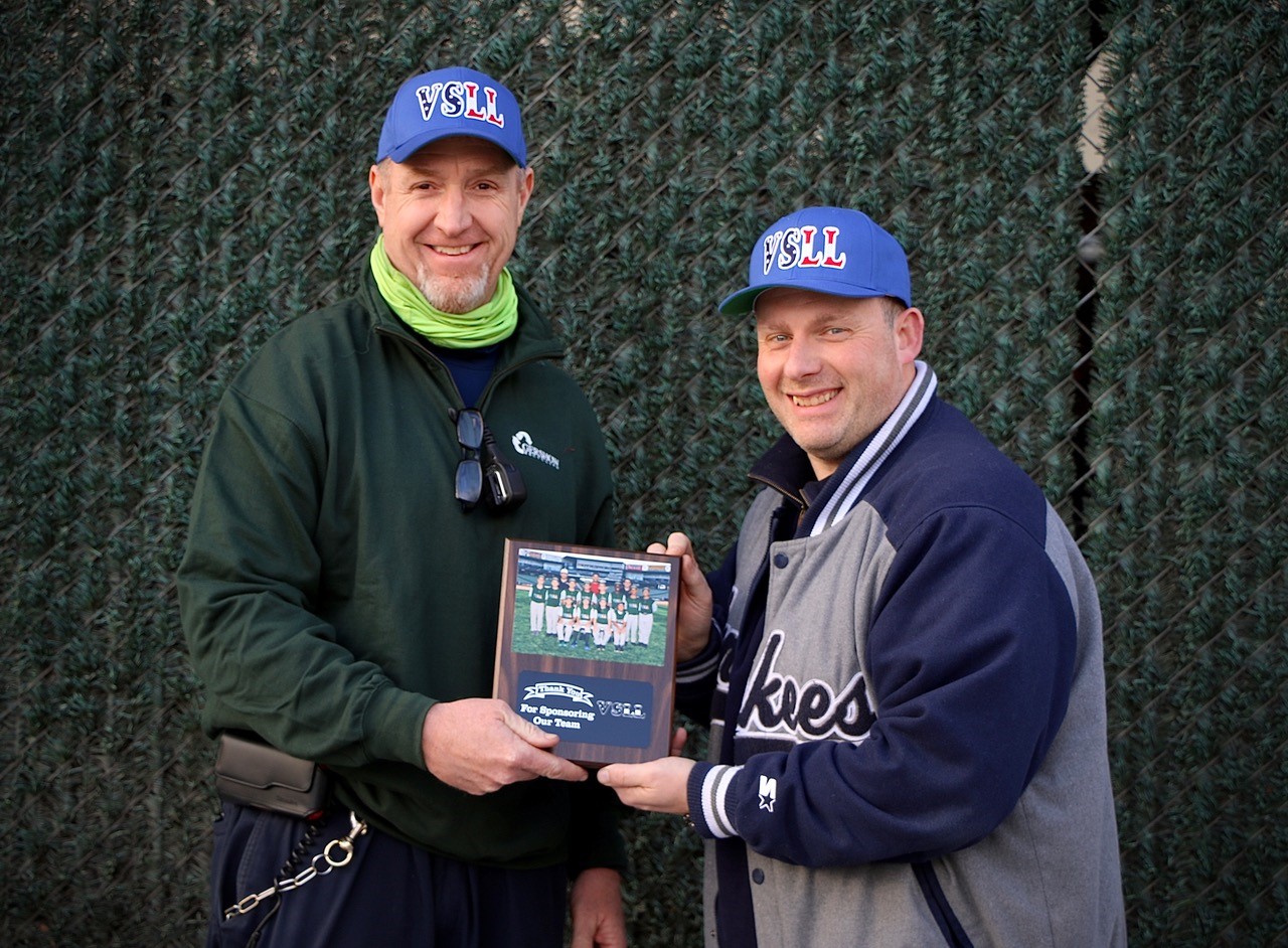 James Fischman (right), Vice President, Valley Stream Little League (VSLL), presents Peter O’Donovan (left), Manager, Gershow Recycling, with a plaque thanking Gershow for its support.